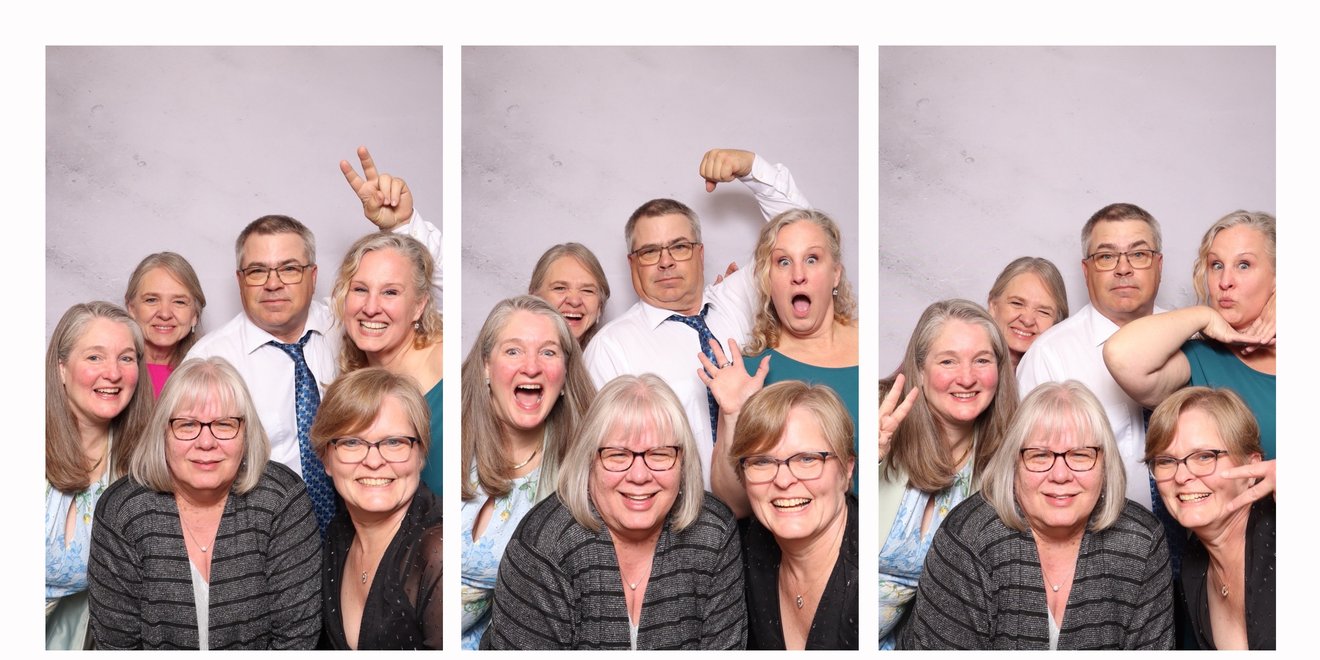 A printed photo booth strip of three frames, a family group posing together.
